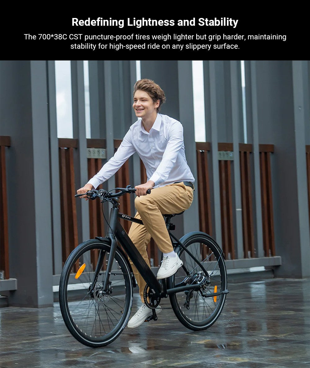 Elektrokolo DYU Stroll 1, motor 250 W, baterie 36 V 9 Ah, pneumatiky CST 700*38C, maximální rychlost 25 km/h, dojezd 100 km, dvojitá hydraulická kotoučová brzda, řazení Shimano 7 rychlostí, LED displej - stříbrné