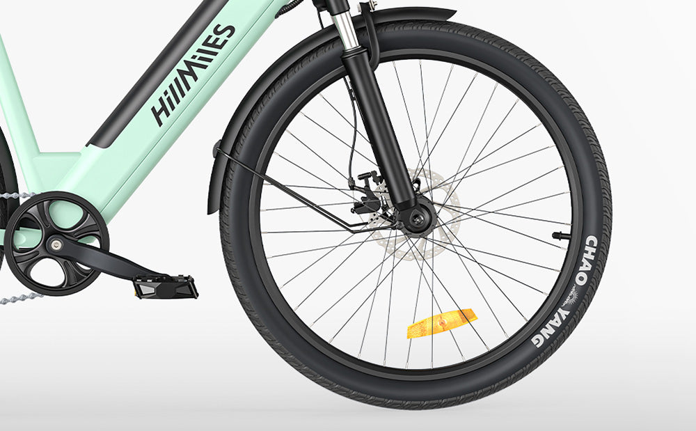 Elektrické kolo HillMiles MileCity1, motor 250 W, baterie 36 V 13 Ah, pneumatiky 26 palců, maximální rychlost 32 km/h, maximální dojezd 100 km, řazení Shimano 7 rychlostí, mechanická kotoučová brzda, odpružená přední vidlice, vodotěsnost IP65 - šedá